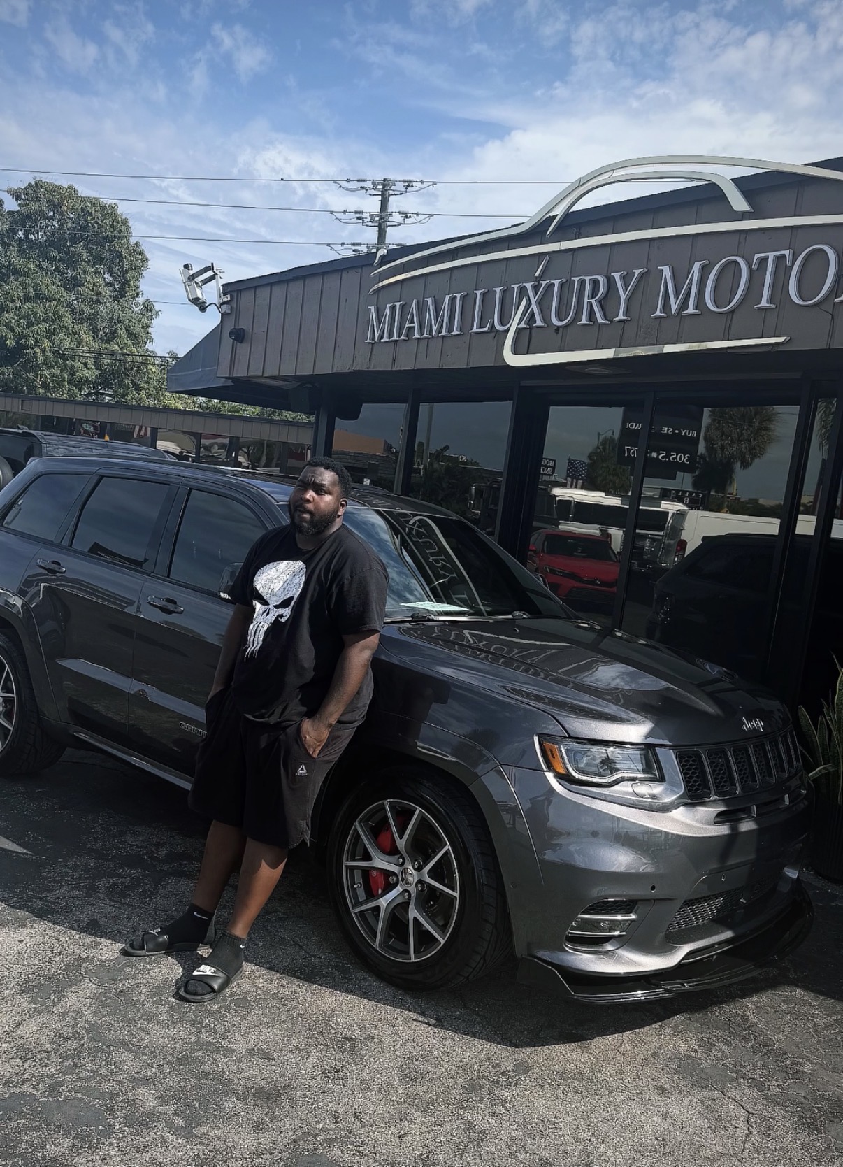 DeAndre L. with their Jeep Grand Cherokee SRT
