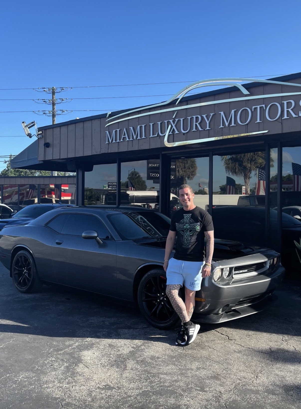 Ricky D. with their Dodge Challenger