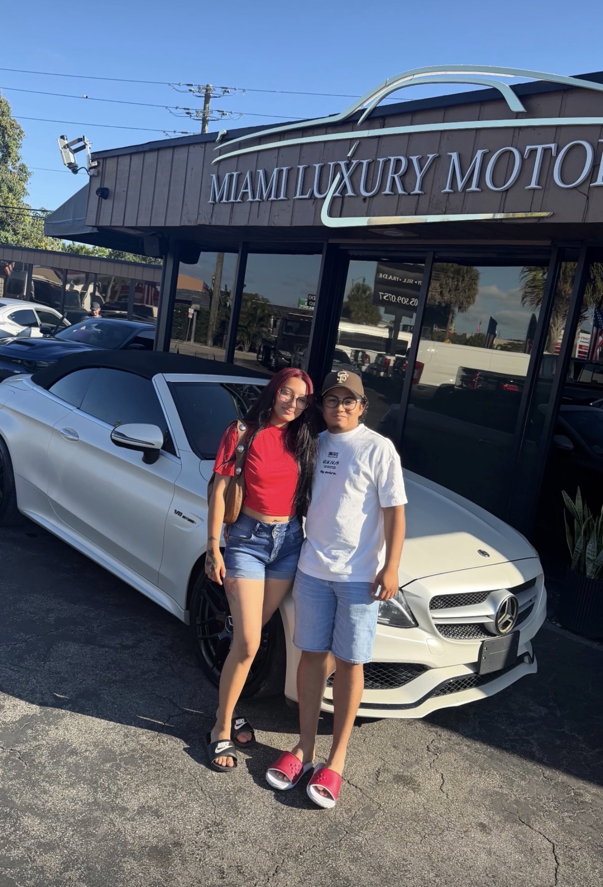 Sofia & Diego with their Mercedes-Benz C63 AMG