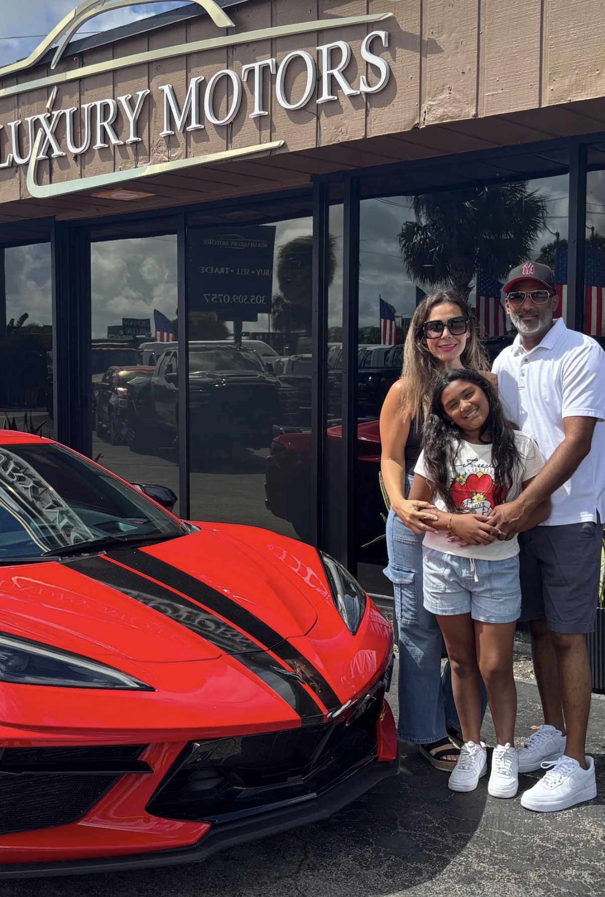 The Rosario Family with their Chevrolet Corvette