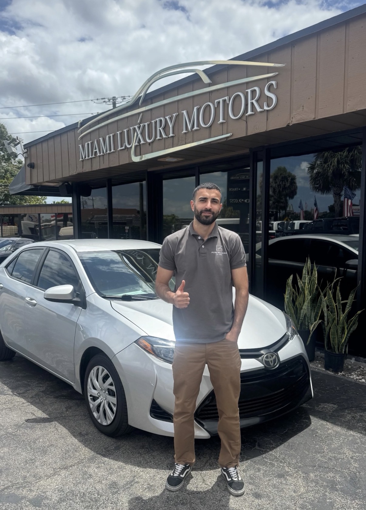 Omar K. with their Toyota Corolla