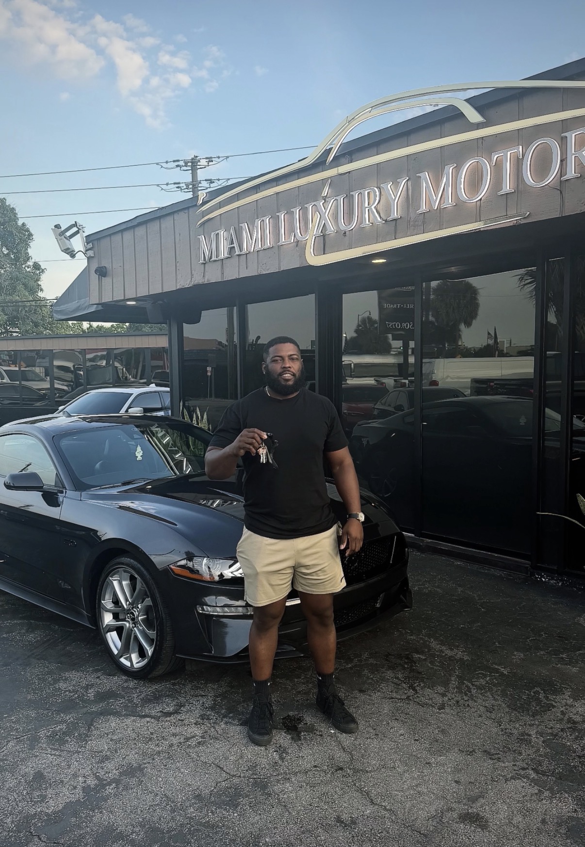 Malik J. with their Ford Mustang